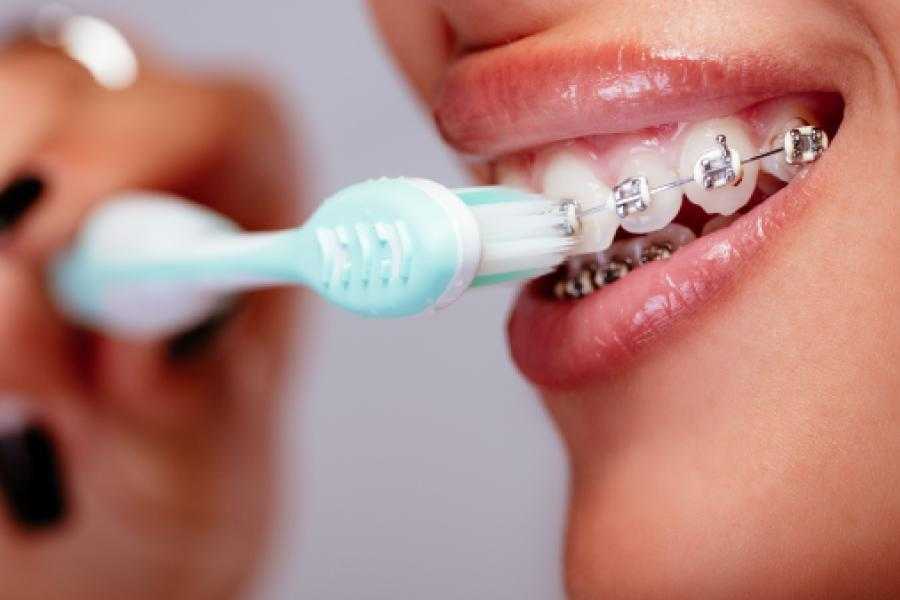 как чистить зубы зубной щеткой
